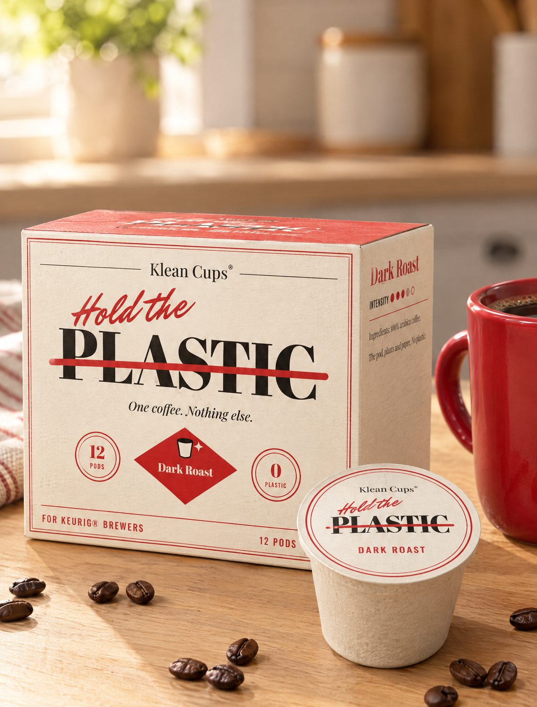 A Dark Roast box and pod on a sunny kitchen counter next to a red mug of coffee